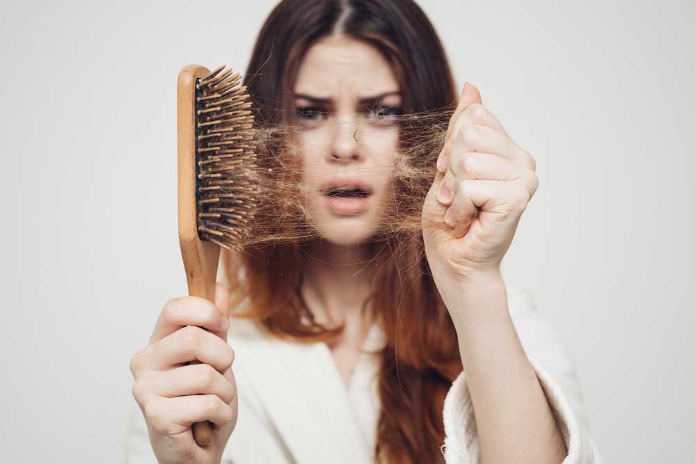 دلیل ریزش مو کدام ویتامین است؟